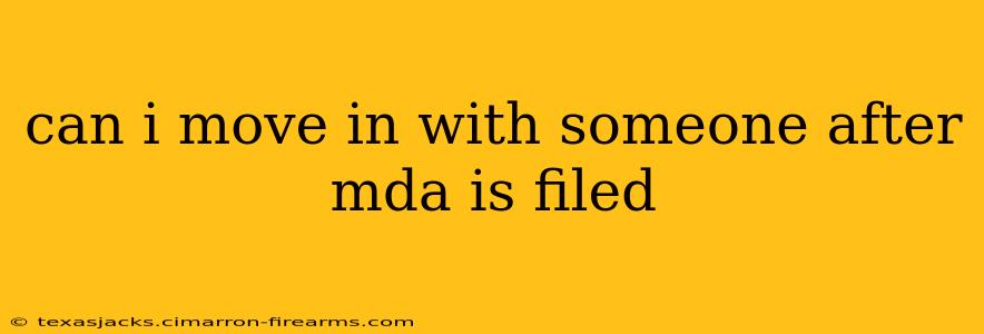 can i move in with someone after mda is filed